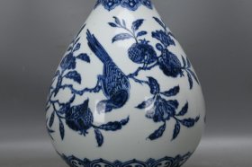 明，宣德青花缠枝莲花鸟玉壶春一个高37厘米，口径8.8厘米，肚径23厘米，底径13厘米。