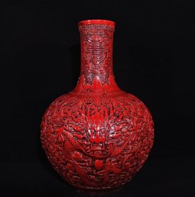 清乾隆红釉高浮雕龙纹天球瓶，高56×40厘米