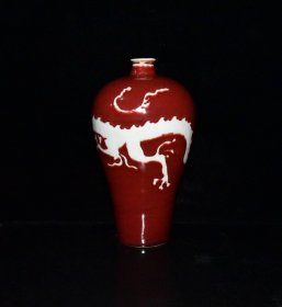 元代霁红留白雕刻龙纹梅瓶一对