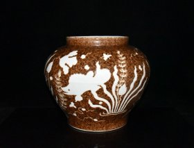 明代永乐黄釉留白雕刻鱼草纹罐一对