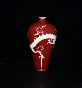 元代霁红留白雕刻龙纹梅瓶一对