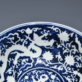 明宣德青花留白穿花龙纹碗