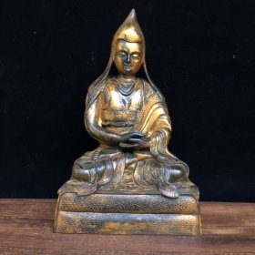 纯铜佛像，高23厘米，宽14厘米，重3320克，