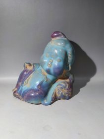 明代钧窑人物。钧瓷窑变玫瑰紫。