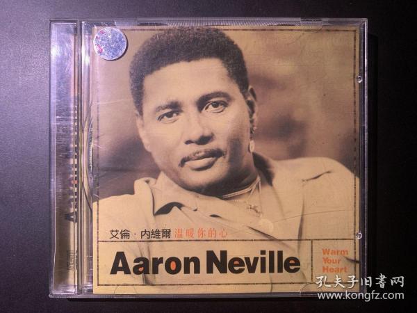 光盘唱片 CD《Aaron Neville   Warm Your  Heart  （亚伦·纳维尔 （昵称：大粒黑） 温暖你的心）》专辑 (实物拍图）福建长龙影视公司出品 有歌词  发行编号：700025  内圈编号：X105  发行时间：1998年