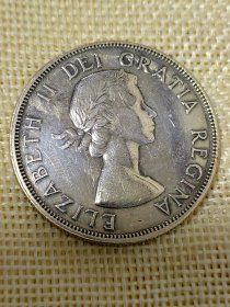 加拿大1元银币 1953年伊丽莎白二世划船银币 PL品无肩带齿边版别少见 mz0223