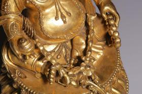 清代，铜鎏金黄财神坐像
高34.5厘米，径22厘米，重8099克