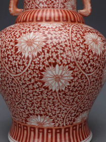 清矾红留白缠枝纹象耳瓶