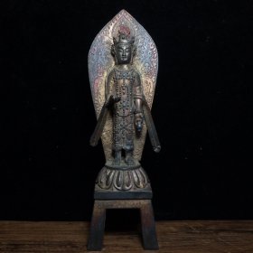 纯铜佛像，高25厘米，宽9厘米，重1030克