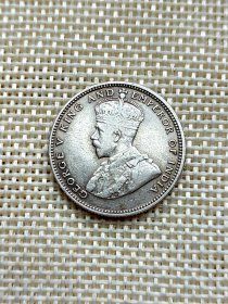 英属海峡殖民地20分银币 1927年乔治五世 5.43克高银 底光极美品 漂亮的品相非常难得 yz0359