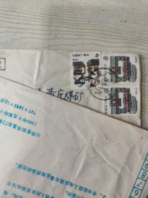 中国邮政实寄封一个，贴有两枚8分的北京民居、一枚4分的江苏民居邮票