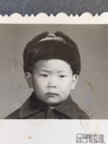 50-60年代小孩雷锋帽照片