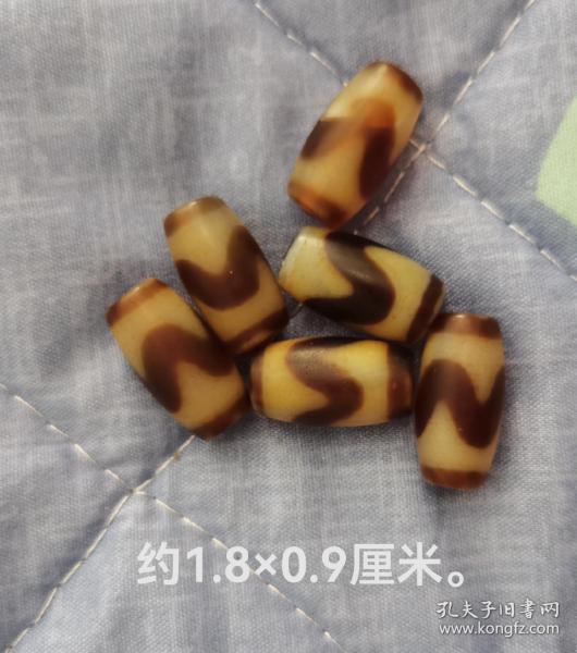 上肯达洛虎牙天珠六枚。