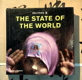 《 REUTERS THE STATE OF THE WORLD 》 《 路透社摄影图片集：这个世界怎样了 》 ( 硬精装英文原版 签名本 )