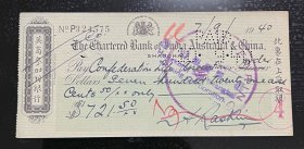 民国支票：小型～1940年英商麦加利银行支票，此票在上海取银。背书：凭汇丰银行收，确保真品，带水印，尺寸：165～75毫米，麦加利银行就是渣打银行，历史悠久。