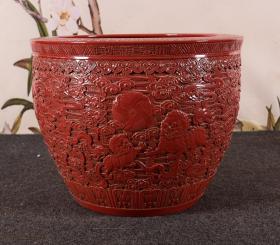 旧藏红釉雕刻《狮子滚绣球》瓷器大缸一口。尺寸高54宽42
