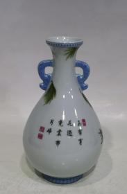 大清雍正年制，粉彩杏林春燕纹玉壶春瓶，高度17.7㎝，口径4.2㎝，底5.3㎝，