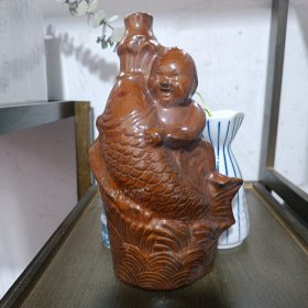 人物酒瓶八九十年代的酱釉雕塑瓷瓶子一个很漂亮。可以做摆件