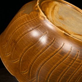 宋定窑刻童子纹葵口碗，高8直径18.5cm，