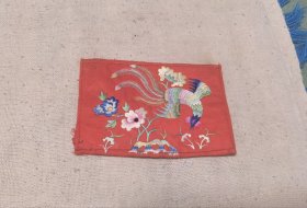 一个凤凰牡丹画片的绣品