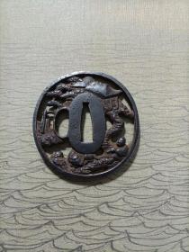 日本江户时代中期著名工匠丶野村包教制丶铁质镂雕“松间牧牛图”刀镡一件