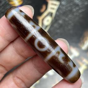 藏传天珠
 尺寸：56*13毫米风化清晰明显