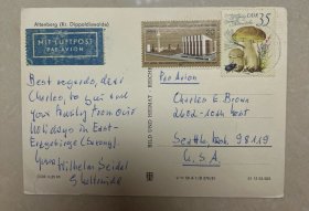 盖销东德邮票2枚实寄德国黑白明信片一张