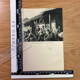 1949年出版物老照片印刷品——屋外挂着纸玩具和鱼干的乡间小店，香港渔村（双面）[CA02+A0037］