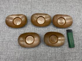 铜胎秀峯堂造款茶托一组五件，有使用痕迹。