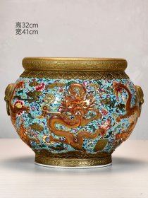 【大清乾隆年制】描金珐琅彩蓝底缠枝花浮雕刻瓷云龙纹案头卷缸。