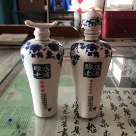 两种版本赊店老酒酒瓶两个，保存完号（客厅酒瓶柜里）