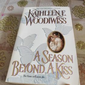 KATHLEENE WOODIWISS A SEASON BEYOND A KISS  原版英文书