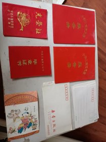 90年代内蒙华油小学生素质发展报告册，80年代华北石油第二采油厂先进生产工作者光荣证书，80年代初华油五中初中毕业证书，新雷出版社信封，八十年代天津老信封*5，中国邮政贺年有奖明信片，可选择购买