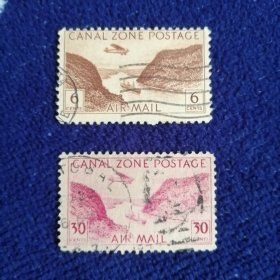 美属运河区航空邮票1931-49年雕刻版飞机飞跃运河2枚信销票不同