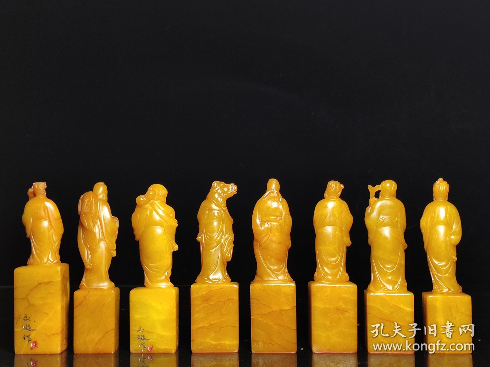 杨玉璇作，田黄石八仙人物印章一套。