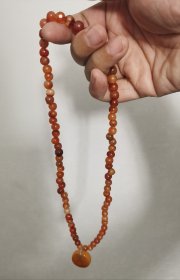 清代玛瑙手持(配大几十年的蜜蜡，总重35克)