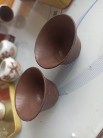老木鱼石茶杯一对，