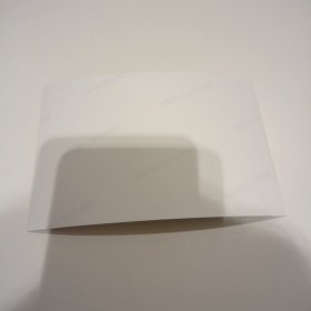 老照片–夫妻二人在海南景区留影（1997年1月，身后有“粤东正气”四个字）