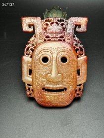 珍藏和田玉石家河文化玉璧，玉面谱