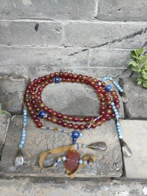 农村收来的朝珠108粒 碧玺的 成色好 配水晶吊坠品相好