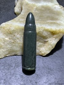 天然新疆和田青玉子 弹通货1颗，