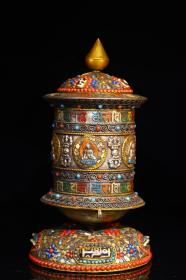 藏区回流镶嵌天珠，宝石转经轮
高16.5厘米直径6.5厘米重约180克