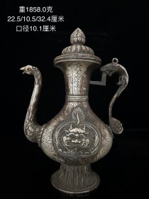 旧藏，龙提凤嘴壶一把。