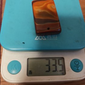 天然玛瑙狐狸头牌饰图案一块放漏出