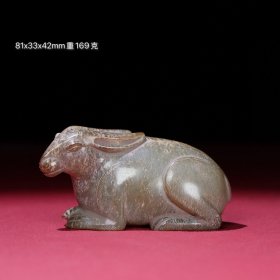 旧藏和田玉灰皮沁玉兔把件