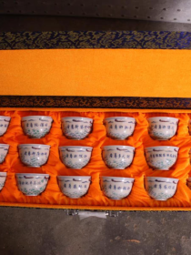 明斗彩十八罗汉纹茶杯一套