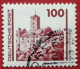 袁袁收藏民主德国邮票 东德 1990年 建筑 埃森纳赫的瓦尔特堡 9-7 信销 位于图林根州爱森纳赫市城西的小山上，为罗曼式建筑。1067年由25岁的路德维希·德·史宾格开始修建，1073年建成。1999年列为世界文化遗产。，是一座几乎没有遭到破坏的中世纪城堡。马丁-路德在此避难，他以神奇的速度将新约从希腊文翻译成德文，城堡中保存有传说中的路德秘密隧道。