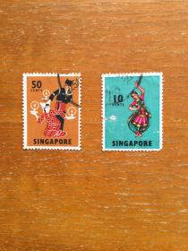 新加坡旧邮票2枚。民族舞蹈。信销票。实图发货。