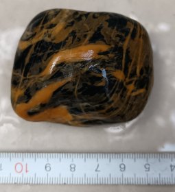 鹅卵石。掌中把玩件