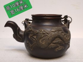 時大彬制，提梁，紫砂壶，造型独特，外观精美，做工精细， 砂质细腻 ，色泽光润， 手感圆滑，品相完美，尺寸如图！